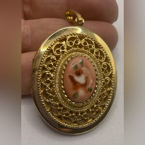 Vintage Gold Tone Oval Locket Pendant Filigree Frame and Floral Centerpiece